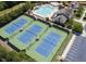 Aerial view of the tennis courts and pool area in this community at 3413 Fairstone Rd, Wake Forest, NC 27587