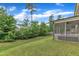 Backyard featuring lush greenery, providing a serene view and privacy at 3413 Fairstone Rd, Wake Forest, NC 27587