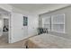 Bright bedroom features a comfortable bed, large windows, and ample closet space, offering a peaceful retreat at 3413 Fairstone Rd, Wake Forest, NC 27587