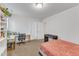This bedroom features neutral walls, carpet, desk area, shelving, and a queen bed at 3413 Fairstone Rd, Wake Forest, NC 27587