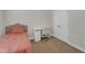 Cozy bedroom featuring a desk, closet, and neutral color scheme at 3413 Fairstone Rd, Wake Forest, NC 27587