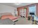 Bedroom features a queen bed, desk area, shelving and one painted accent wall at 3413 Fairstone Rd, Wake Forest, NC 27587
