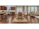 A lovely open concept dining room featuring brown cabinets, stainless steel appliances, and lots of light at 3413 Fairstone Rd, Wake Forest, NC 27587
