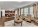Bright open concept with fireplace, lots of windows, and a kitchen view at 3413 Fairstone Rd, Wake Forest, NC 27587