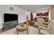 Bright open concept with television, fireplace, and a kitchen view at 3413 Fairstone Rd, Wake Forest, NC 27587