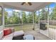 Relaxing screened porch with comfortable seating, perfect for enjoying the outdoors bug-free at 3413 Fairstone Rd, Wake Forest, NC 27587