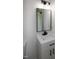 This is a bathroom with a white vanity, black fixtures, and a modern mirror at 3417 Aspen Rd, Rocky Mount, NC 27804