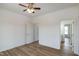 Bright bedroom with hardwood floors, white walls, and a ceiling fan for a cool breeze at 3417 Aspen Rd, Rocky Mount, NC 27804