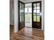 Spacious entryway with hardwood floors and an open view of the living room at 3417 Aspen Rd, Rocky Mount, NC 27804