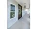 Covered front porch features classic design elements and a welcoming entrance at 3417 Aspen Rd, Rocky Mount, NC 27804