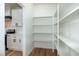 Open pantry featuring generous shelving and easy access to kitchen at 3417 Aspen Rd, Rocky Mount, NC 27804