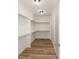 Spacious walk-in closet with ample shelving and modern lighting at 3417 Aspen Rd, Rocky Mount, NC 27804