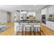 Bright kitchen with a large island, perfect for entertaining, and stainless steel appliances at 4109 City Of Oaks Wynd, Raleigh, NC 27612