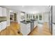 Open kitchen with an island and stainless appliances, offering a perfect layout for cooking at 4109 City Of Oaks Wynd, Raleigh, NC 27612