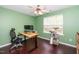 Home office with sleek desk, ergonomic chair, and a window view at 4114 Brenmar Ln, Durham, NC 27713