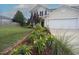 Inviting home with well-maintained lawn and landscaping at 412 Ashdale Dr, Fuquay Varina, NC 27526