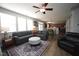 Bright and airy living area featuring hardwood flooring and stylish furniture at 412 Ashdale Dr, Fuquay Varina, NC 27526