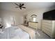 Spacious main bedroom with vaulted ceiling, dresser, walk-in closet and attached bath at 412 Ashdale Dr, Fuquay Varina, NC 27526