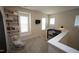 Charming upstairs nook with built-in shelves, a desk, and comfortable seating at 412 Ashdale Dr, Fuquay Varina, NC 27526