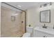 Bathroom featuring a vanity with marble top, black faucet and beautiful tile shower at 4504 Ryegate Dr, Raleigh, NC 27604