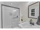 Stylish bathroom featuring a glass-enclosed shower, sleek fixtures, and modern vanity at 4504 Ryegate Dr, Raleigh, NC 27604