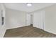 Bright bedroom features hardwood floors and a closet at 4504 Ryegate Dr, Raleigh, NC 27604