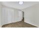 Bright bedroom features hardwood floors and a closet at 4504 Ryegate Dr, Raleigh, NC 27604