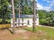 Charming two-story home with a well-manicured front lawn and mature trees at 4504 Ryegate Dr, Raleigh, NC 27604
