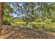 Picturesque view of a pond with reflections of the surrounding trees and greenery at 4504 Ryegate Dr, Raleigh, NC 27604