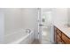 An attached bathroom features a large soaking tub and a doorway leading to the bedroom at 5031 Eagle Stone Ln, Raleigh, NC 27610