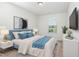 Comfortable bedroom with a large bed, stylish decor, and a window that brightens the space at 5031 Eagle Stone Ln, Raleigh, NC 27610