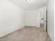 An empty bedroom with carpet and white walls, awaiting personalization and decoration at 5031 Eagle Stone Ln, Raleigh, NC 27610
