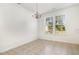 Bright dining room with chandelier and large window at 5031 Eagle Stone Ln, Raleigh, NC 27610