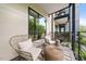 Charming balcony with comfortable seating and a view of the surrounding greenery at 515 N Churton St # Ste 201, Hillsborough, NC 27278