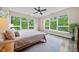 Beautiful bedroom featuring large windows with natural light and modern decor at 515 N Churton St # Ste 201, Hillsborough, NC 27278