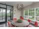 Conference room featuring modern lighting, large windows, and seating for six at 515 N Churton St # Ste 201, Hillsborough, NC 27278