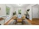 Cozy dining room featuring a glass table with seating for six, light-colored walls, and stylish decor at 5315 Fortunes Ridge Dr, Durham, NC 27713
