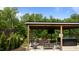 Outdoor living space with hot tub and comfortable seating for entertaining at 55 Prospectus Ln, Franklinton, NC 27525