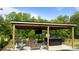 Outdoor living space with hot tub and comfortable seating for entertaining at 55 Prospectus Ln, Franklinton, NC 27525