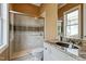 Bathroom featuring a frameless glass shower, granite countertops, and a decorative sink at 603 Hawks Ridge Ct, Apex, NC 27539