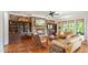 Cozy living room features a stone fireplace, built-in shelving, and comfortable seating at 603 Hawks Ridge Ct, Apex, NC 27539
