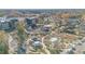 A stunning aerial of a large, mixed-use park with walking paths, unique architecture, and green spaces at 603 Kildaire Farm Road Rd, Cary, NC 27511