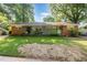 Traditional brick duplex with a shared front porch and green lawn at 603 Kildaire Farm Road Rd, Cary, NC 27511