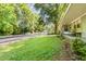 Inviting front yard with a lush lawn and a charming covered porch at 603 Kildaire Farm Road Rd, Cary, NC 27511