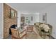 Cozy living room with a brick fireplace, comfortable seating, and a welcoming ambiance at 608 Cross Timbers Dr, Durham, NC 27713