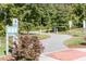 Picturesque walking path winding through a green area, encouraging outdoor activities and exploration at 608 Cross Timbers Dr, Durham, NC 27713