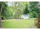 Spacious backyard with a storage shed providing ample space for activities at 612 Dunbar St, Durham, NC 27701