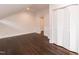 A light-filled bedroom featuring beautiful hardwood floors and white closet doors at 612 Dunbar St, Durham, NC 27701