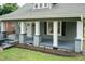 Close-up view of the porch area on a freshly painted craftsman style home at 612 Dunbar St, Durham, NC 27701