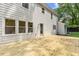 Back of the house with a large wooden deck and several windows at 6709 Sunhaven Pl, Raleigh, NC 27615